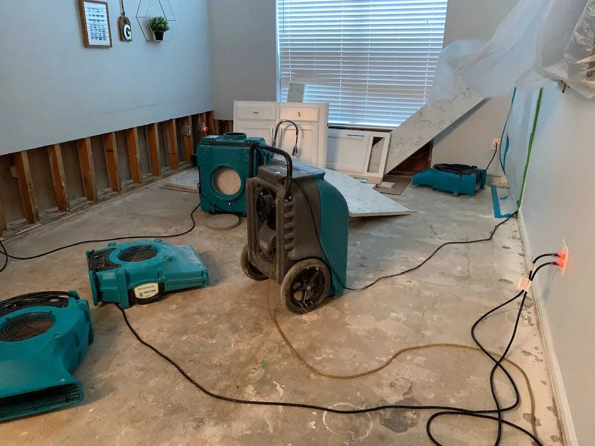Dehumidifier in flood-cut room for Water Damage Restoration in Mullica